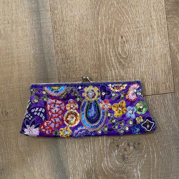 Cache Handbags - Purple clutch with beaded strap